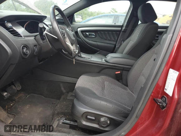 2015 Ford Taurus SEL with VIN 1FAHP2E88FG166961, listed as a Copart auction lot 61429255 with 124,780 mi miles and Salvage title. Bid and sale history available at DreamBid. Image 7.