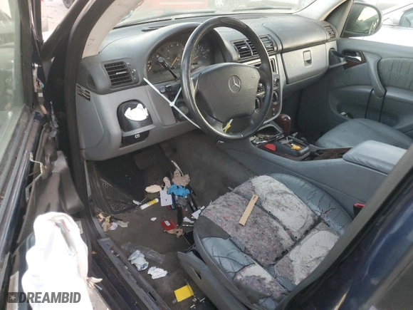 2001 Mercedes-Benz M-Class with VIN 4JGAB72E91A260677, listed as a Copart auction lot 89200235 with 180,414 mi miles and Salvage Title. Bid and sale history available at carsss.com. Image 8.