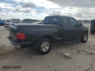 2002 Ford F-150 XL with VIN 2FTRX07222CA18022, listed as a Copart auction lot 80419784 with 283,975 mi miles and Salvage Title. Bid and sale history available at carsss.com. Image 3.
