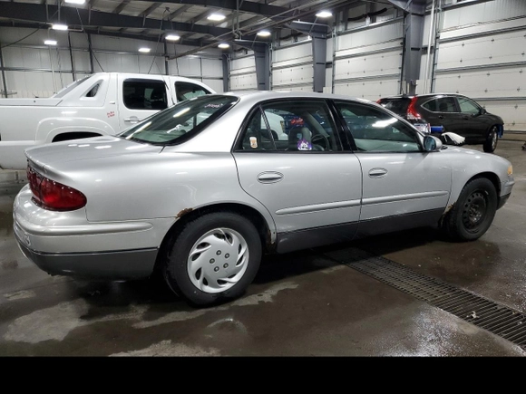 2003 Buick Regal GS with VIN 2G4WF551X31225201, listed as a Copart auction lot 73223284 with 203,119 mi miles and Salvage Title. Bid and sale history available at carsss.com. Image 3.