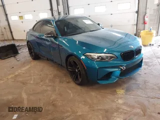 2018 BMW M2 z VIN WBS1J5C58JVD36727, wystawiony jako IAAI lot #41939937 z przebiegiem 31 959 mil mil oraz . Historia ofert i sprzedaży dostępna na DreamBid. Obrazek 1.