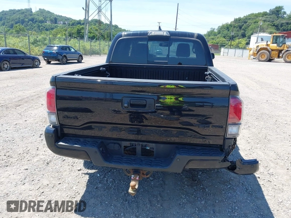2019 Toyota Tacoma SR with VIN 5TFCZ5AN4KX208354, listed as a IAAI auction lot 42771410 with 77,509 mi miles and . Bid and sale history available at DreamBid. Image 17.