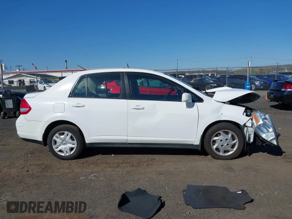 2011 Nissan Versa 1.8 S with VIN 3N1BC1AP5BL390720, listed as a IAAI auction lot 41962212 with 120,516 mi miles. Bid and sale history available at carsss.com. Image 13.