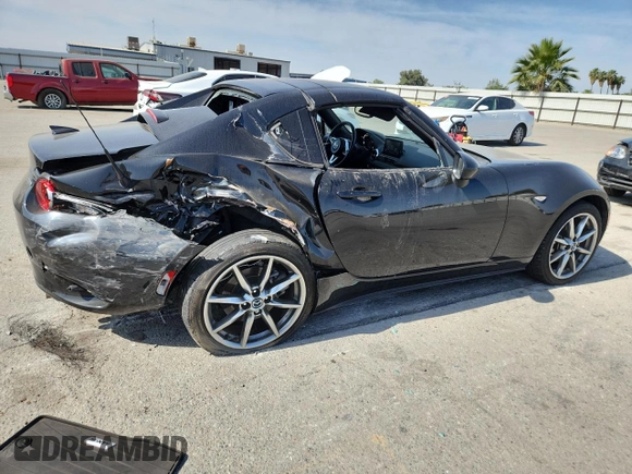 2022 Mazda MX-5 Miata Grand Touring z VIN JM1NDAM77N0503295, wystawiony jako Copart lot #58703795 z przebiegiem 14 237 mil mil oraz Szkoda całkowita • Salvage title. Historia ofert i sprzedaży dostępna na DreamBid. Obrazek 3.