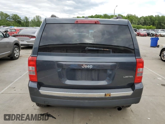 2014 Jeep Patriot Limited with VIN 1C4NJPCB9ED900811, listed as a Copart auction lot 58061115 with 230,415 mi miles and Salvage title. Bid and sale history available at DreamBid. Image 6.