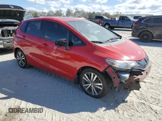 2015 Honda Fit EX-L with VIN 3HGGK5H83FM771673, listed as a Copart auction lot 76297004 with 186,736 mi miles and Salvage Title. Bid and sale history available at DreamBid. Image 4.
