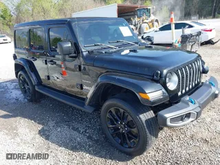 2023 Jeep Wrangler 4xe Sahara with VIN 1C4JJXP64PW559398, listed as a IAAI auction lot 41796904 with 1 mi miles. Bid and sale history available at carsss.com. Image 1.