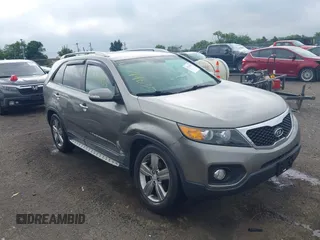 2012 Kia Sorento EX with VIN 5XYKUCA67CG297686, listed as a IAAI auction lot 42719835 with 98,771 mi miles and . Bid and sale history available at DreamBid. Image 1.