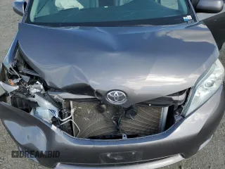 2011 Toyota Sienna XLE with VIN 5TDDK3DC2BS028058, listed as a Copart auction lot 54374215 with 216,905 mi miles and Salvage Title. Bid and sale history available at DreamBid. Image 12.