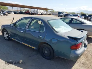 1994 Nissan Altima XE with VIN 1N4BU31D7RC140404, listed as a IAAI auction lot 41934492 with 160,073 mi miles and . Bid and sale history available at DreamBid. Image 3.