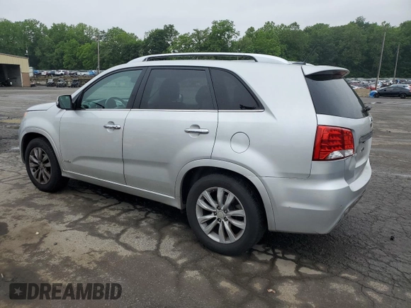 2013 Kia Sorento SX with VIN 5XYKWDA27DG364852, listed as a Copart auction lot 60194635 with 146,829 mi miles and Salvage title. Bid and sale history available at DreamBid. Image 2.