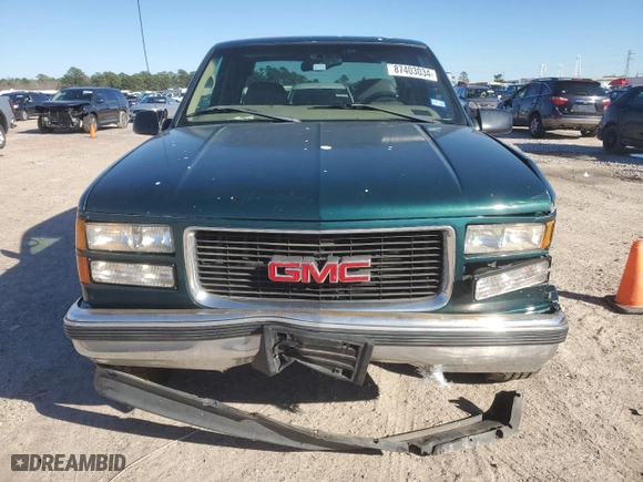 1998 GMC Sierra 1500 with VIN 1GTEC19R6WR504609, listed as a Copart auction lot 87403034 with 198,155 mi miles and Salvage Title. Bid and sale history available at carsss.com. Image 5.