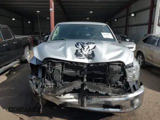 2015 Ram 1500 Big Horn with VIN 1C6RR6GT8FS569506, listed as a IAAI auction lot 41668921 with 214,708 mi miles. Bid and sale history available at carsss.com. Image 6.