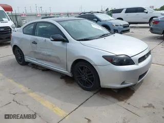 2006 Scion tC with VIN JTKDE177960125897, listed as a IAAI auction lot 41964589 with 215,443 mi miles. Bid and sale history available at carsss.com. Image 1.