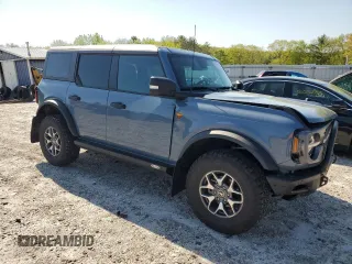 2023 Ford Bronco with VIN 1FMEE5DH2PLB00979, listed as a Copart auction lot 56652305 with 31,653 mi miles and Salvage title. Bid and sale history available at DreamBid. Image 4.