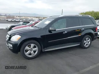 2011 Mercedes-Benz GL-Class GL 450 with VIN 4JGBF7BE1BA752615, listed as a IAAI auction lot 41075508 with 165,605 mi miles. Bid and sale history available at carsss.com. Image 12.