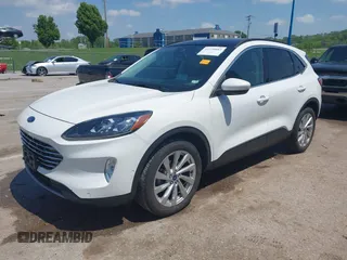 2021 Ford Escape Titanium with VIN 1FMCU9J91MUA29407, listed as a IAAI auction lot 42120442 with 19,314 mi miles and . Bid and sale history available at DreamBid. Image 2.