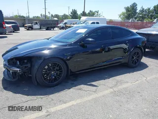 2022 Tesla Model S with VIN 5YJSA1E51NF464231, listed as a IAAI auction lot 42077838 with 53,290 mi miles and . Bid and sale history available at DreamBid. Image 20.