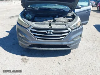 2017 Hyundai Tucson SE Plus with VIN KM8J33A45HU452928, listed as a IAAI auction lot 41601229 with 114,949 mi miles. Bid and sale history available at carsss.com. Image 6.
