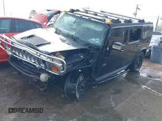 2006 Hummer H2 with VIN 5GRGN23U06H113353, listed as a IAAI auction lot 41476649 with 165,370 mi miles. Bid and sale history available at carsss.com. Image 17.