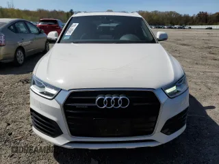 2018 Audi Q3 Premium with VIN WA1ECCFS7JR019255, listed as a Copart auction lot 54581155 with 76,923 mi miles and Salvage title. Bid and sale history available at DreamBid. Image 5.