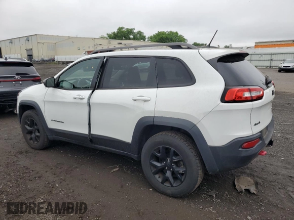 2015 Jeep Cherokee Trailhawk with VIN 1C4PJMBS6FW680963, listed as a Copart auction lot 61306385 with 174,793 mi miles and Clean title. Bid and sale history available at DreamBid. Image 2.