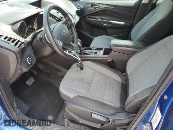 2017 Ford Escape S with VIN 1FMCU0F79HUE27926, listed as a Copart auction lot 56143655 with 55,382 mi miles and Salvage title. Bid and sale history available at DreamBid. Image 7.