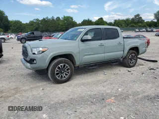 2023 Toyota Tacoma SR with VIN 3TYCZ5AN9PT119543, listed as a Copart auction lot 63447845 with 25,133 mi miles and Salvage title. Bid and sale history available at DreamBid. Image 1.