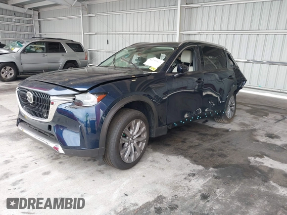 2024 Mazda CX-90 Premium Plus with VIN JM3KKEHD8R1186750, listed as a IAAI auction lot 41795353 with 5,144 mi miles and . Bid and sale history available at DreamBid. Image 17.