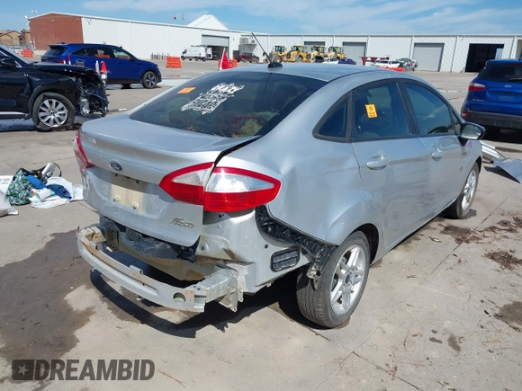 2019 Ford Fiesta SE with VIN 3FADP4BJXKM146258, listed as a IAAI auction lot 41652852 with 94,379 mi miles. Bid and sale history available at carsss.com. Image 4.