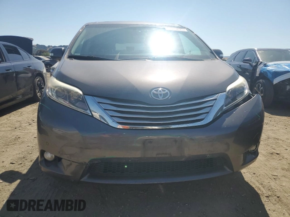 2015 Toyota Sienna Limited с VIN 5TDDK3DC7FS104041, выставлен на аукционе Copart как лот 62410335 с пробегом 112 755 миль миль и Списание • Salvage title. История ставок и продаж доступна на DreamBid. Изображение 5.