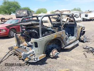 2014 Jeep Wrangler Rubicon with VIN 1C4BJWCG6EL126340, listed as a IAAI auction lot 42654467 with Not provided miles and . Bid and sale history available at DreamBid. Image 4.