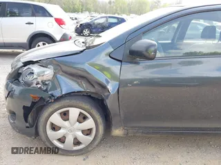 2008 Toyota Yaris with VIN JTDBT923584007171, listed as a IAAI auction lot 42118892 with 202,689 mi miles. Bid and sale history available at carsss.com. Image 12.