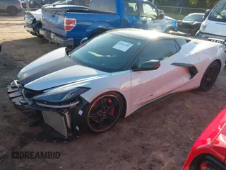 2021 Chevrolet Corvette 2LT with VIN 1G1YB3D45M5125069, listed as a IAAI auction lot 41165588 with 8,765 mi miles. Bid and sale history available at carsss.com. Image 2.