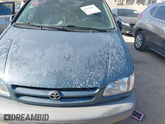 2000 Toyota Sienna LE with VIN 4T3ZF13C2YU204601, listed as a IAAI auction lot 42679413 with 253,235 mi miles and . Bid and sale history available at DreamBid. Image 6.