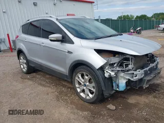 2014 Ford Escape Titanium с VIN 1FMCU0J97EUA47620, выставлен на аукционе IAAI как лот 42321452 с пробегом 132 070 миль миль и . История ставок и продаж доступна на DreamBid. Изображение 1.
