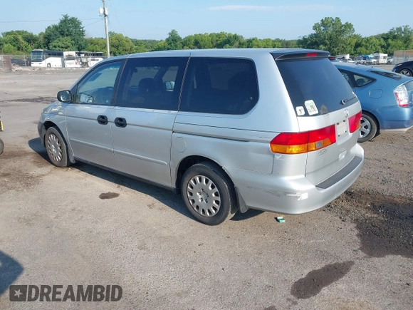 2004 Honda Odyssey LX with VIN 5FNRL18534B007617, listed as a IAAI auction lot 42687524 with 220,079 mi miles and . Bid and sale history available at DreamBid. Image 3.