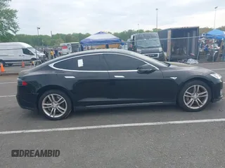 2014 Tesla Model S 60 with VIN 5YJSA1H13EFP33693, listed as a IAAI auction lot 42132094 with Not Provided miles and . Bid and sale history available at DreamBid. Image 12.