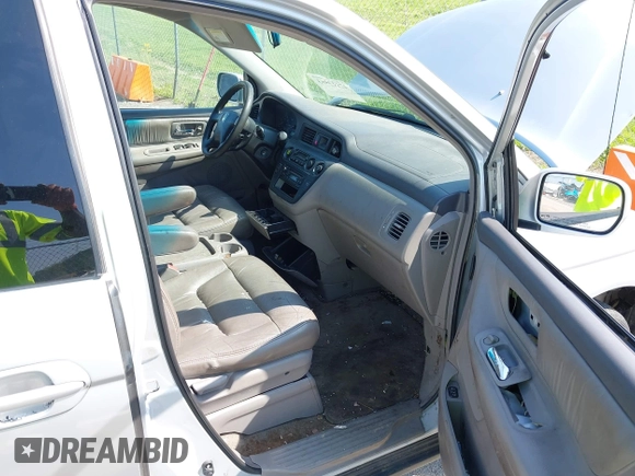 2003 Honda Odyssey EX-L with VIN 5FNRL18983B050769, listed as a IAAI auction lot 42113963 with 287,552 mi miles and . Bid and sale history available at DreamBid. Image 5.