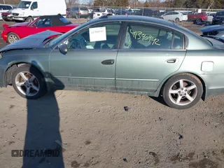 2005 Nissan Altima SE with VIN 1N4BL11E65C118744, listed as a IAAI auction lot 41390942 with 1 mi miles. Bid and sale history available at carsss.com. Image 14.