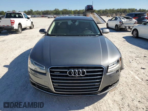 2015 Audi A8 with VIN WAUJGAFD5FN009026, listed as a Copart auction lot 81938904 with 122,880 mi miles and Salvage title. Bid and sale history available at DreamBid. Image 5.