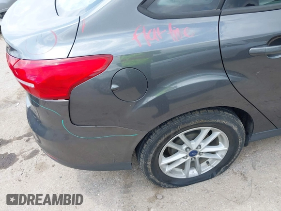 2017 Ford Focus SE with VIN 1FADP3F23HL232809, listed as a IAAI auction lot 42117700 with 104,802 mi miles and . Bid and sale history available at DreamBid. Image 6.