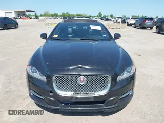 2015 Jaguar XJ R-Sport with VIN SAJWJ1CD6F8V83990, listed as a IAAI auction lot 41936162 with Not Provided miles and . Bid and sale history available at DreamBid. Image 12.