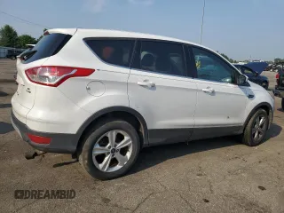 2014 Ford Escape SE z VIN 1FMCU9GX5EUC60849, wystawiony jako Copart lot #60498575 z przebiegiem Nie podano mil oraz Szkoda całkowita • Salvage title. Historia ofert i sprzedaży dostępna na DreamBid. Obrazek 3.