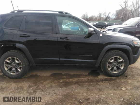 2019 Jeep Cherokee Trailhawk with VIN 1C4PJMBX1KD331128, listed as a IAAI auction lot 41983976 with 110,190 mi miles and . Bid and sale history available at DreamBid. Image 13.
