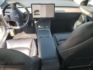 2023 Tesla Model 3 with VIN 5YJ3E1EA8PF449797, listed as a Copart auction lot 64601115 with 99,771 mi miles and Clean title. Bid and sale history available at DreamBid. Image 8.