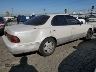 1994 Lexus ES 300 с VIN JT8GK13T1R0051202, выставлен на аукционе Copart как лот 83668264 с пробегом 165 148 миль миль и Списание • Salvage title. История ставок и продаж доступна на DreamBid. Изображение 3.