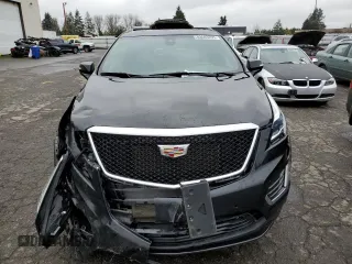 2021 Cadillac XT5 AWD Sport z VIN 1GYKNGRS3MZ158562, wystawiony jako Copart lot #43593295 z przebiegiem 32 293 mil mil oraz Szkoda całkowita • Salvage title. Historia ofert i sprzedaży dostępna na DreamBid. Obrazek 5.