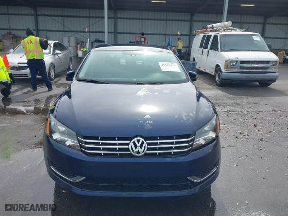 2014 Volkswagen Passat Wolfsburg Ed with VIN 1VWAT7A3XEC085932, listed as a IAAI auction lot 41567573 with 165,154 mi miles. Bid and sale history available at carsss.com. Image 6.