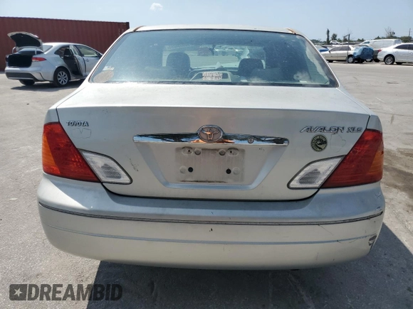 2000 Toyota Avalon XL with VIN 4T1BF28B4YU059562, listed as a Copart auction lot 58356285 with Not provided miles and Salvage title. Bid and sale history available at DreamBid. Image 6.